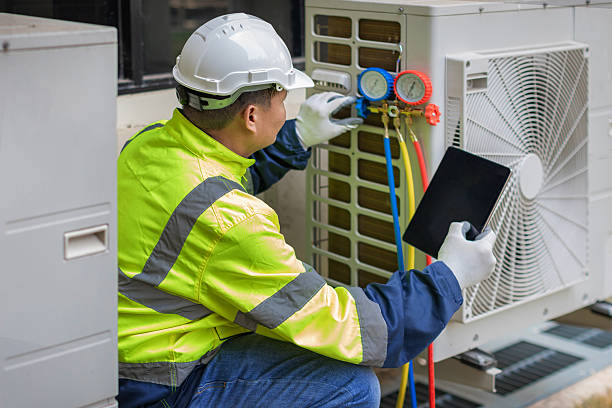 Professional Hvac technician working in Hyde Park, MA
